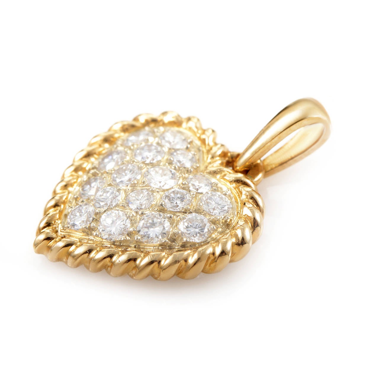 A pretty pave of diamonds is the hallmark of this elegant pendant from Van Cleef & Arpels. The heart-shaped pendant is made of 18K yellow gold and is set with an ~.75ct diamond pave.