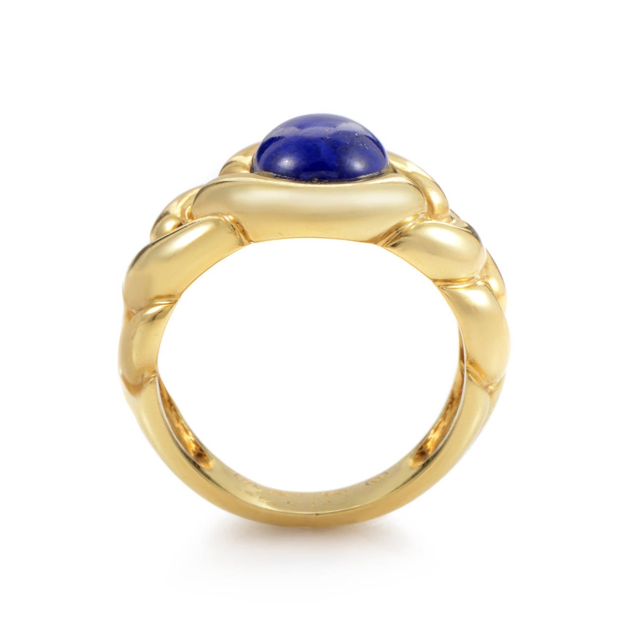 This gorgeous ring from Van Cleef & Arpels shines with an exceptional beauty and elegance. The ring is made of 18K yellow gold and boasts an elusive lapis cabochon main stone.
Ring Size: 6.25 (52 1/8)
