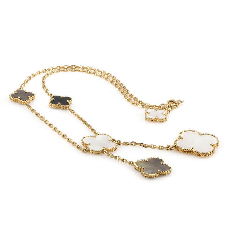 A wildly popular design from a premier brand, the Van Cleef & Arpels Magic Alhambra necklace is a must-have accessory. This necklace is made of 18K yellow gold and features six of the brand's signature Alhambra motifs set with mother of