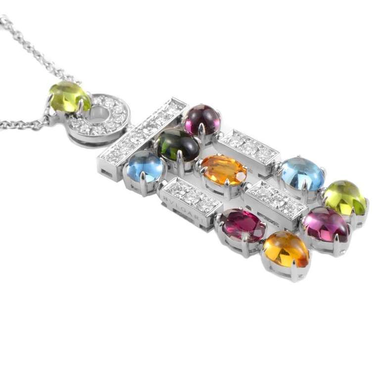 The Color Collection embodies Bulgari's distinctive use of colored gemstones for an exceptional and playful look. The necklace is made of 18K white gold and features an elaborate pendant set with various gemstones and an ~1.25ct diamond