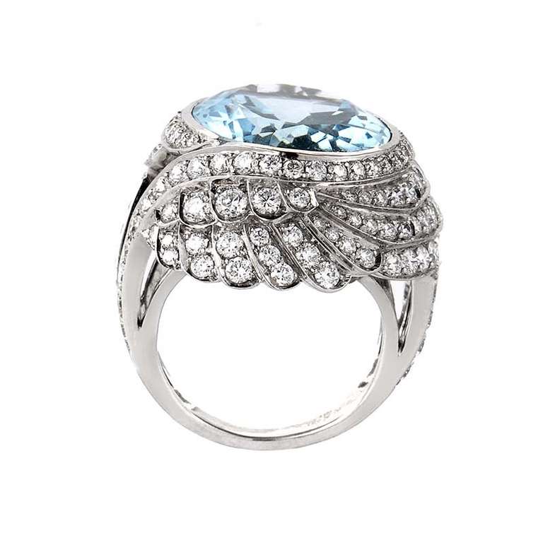 This Garrard ring transcends time with its refreshing design and opulent gemstones. It is made of 18K white gold and boasts a staggering ~13.92ct aquamarine stone. Lastly, the ornately designed bezel is set with ~2.71ct of diamonds.
Ring Size: