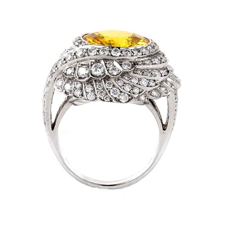 This cocktail ring from Garrard is bright and shines with an ethereal beauty. It is made of 18K white gold and boasts an ~6ct yellow citrine stone. Lastly, the ornately designed bezel is set with ~1.98ct of diamonds.
Retail Price: $18,000.00
Ring