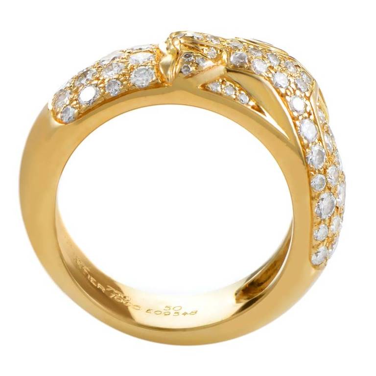 The Panthere collection from Cartier is renowned worldwide for its fierce and unique designs. The ring from the collection is made from 18K yellow gold and is set with a ravishing ~1ct diamond pave. Lastly, a single glittering emerald is the