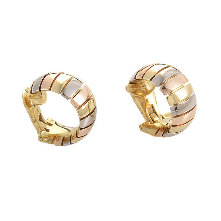 The enduring quality of this glamorous pair of earrings from Cartier is without comparison. The earrings are clip-ons and are made of 18K white, yellow, and rose gold.
Included Items: Manufacturer's Box