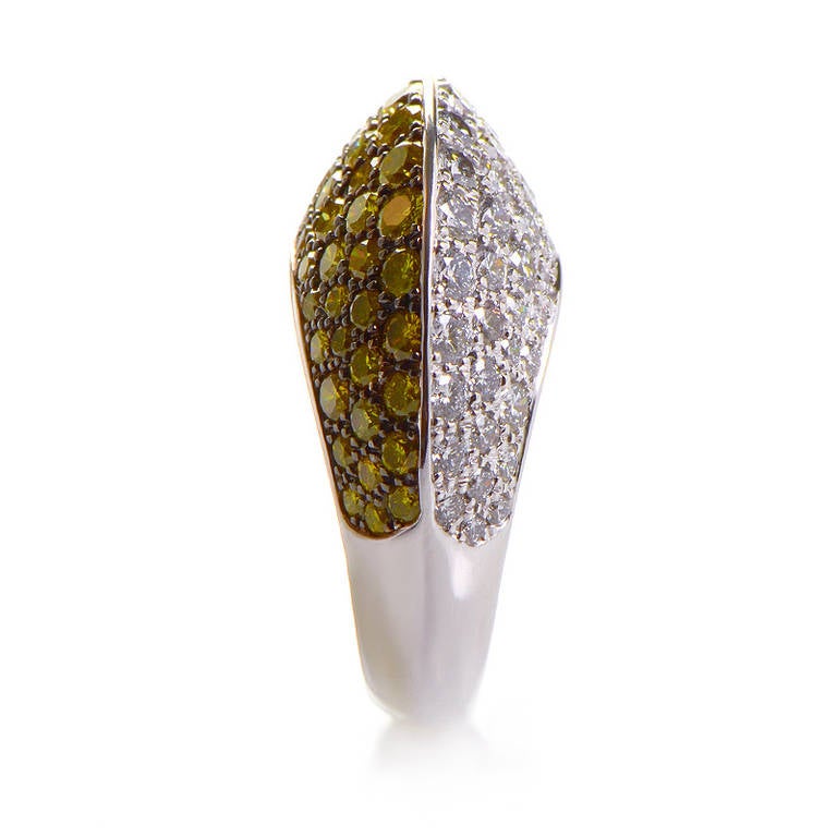 This ring from Chopard is unique and sophisticated. It is made of 18K white gold and boasts ~3.25ct of white and yellow diamonds.
Ring Size: 7.25
Retail Price: $53,600.00