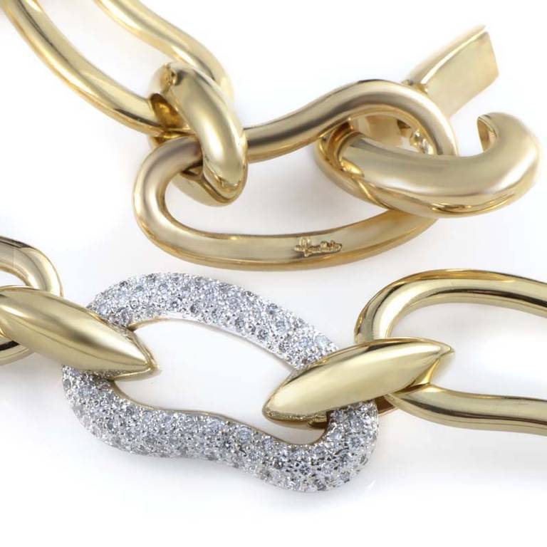 The enduring quality of this fabulous Pomellato bracelet is absolutely incredible, as is its design. The bracelet is comprised of 18K yellow gold links except for a single white gold link. The white gold link is set with a pristine white ~.75ct
