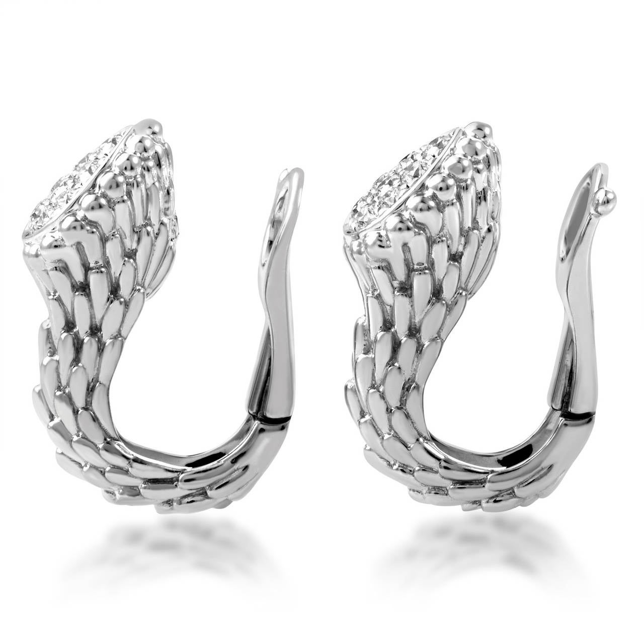 The Toi et Moi collection from Boucheron boasts gorgeous designs that are unlike any other. The earrings are made of carved 18K white gold and are decorated with .25 carats of shimmering white diamonds.