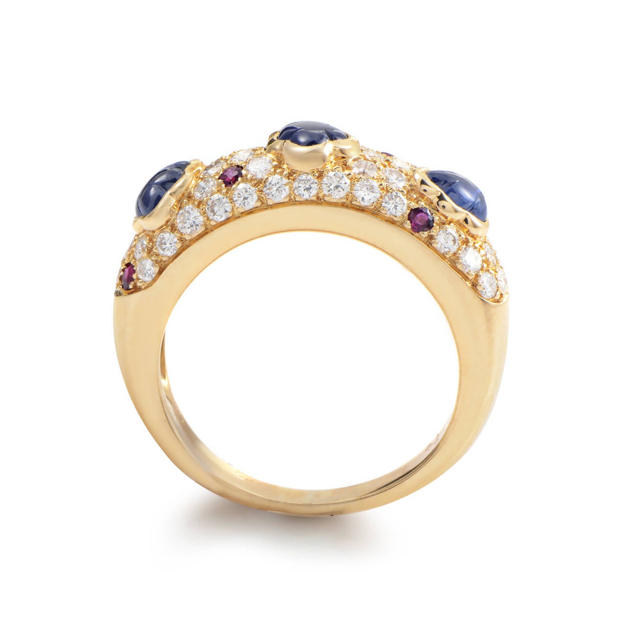 A gorgeous mélange of precious gemstones is the hallmark of this band ring from Cartier. The ring is made of 18K yellow gold and is set with a pave of diamonds and rubies. Lastly, three uniquely shaped sapphires complete this lavish look.
Ring