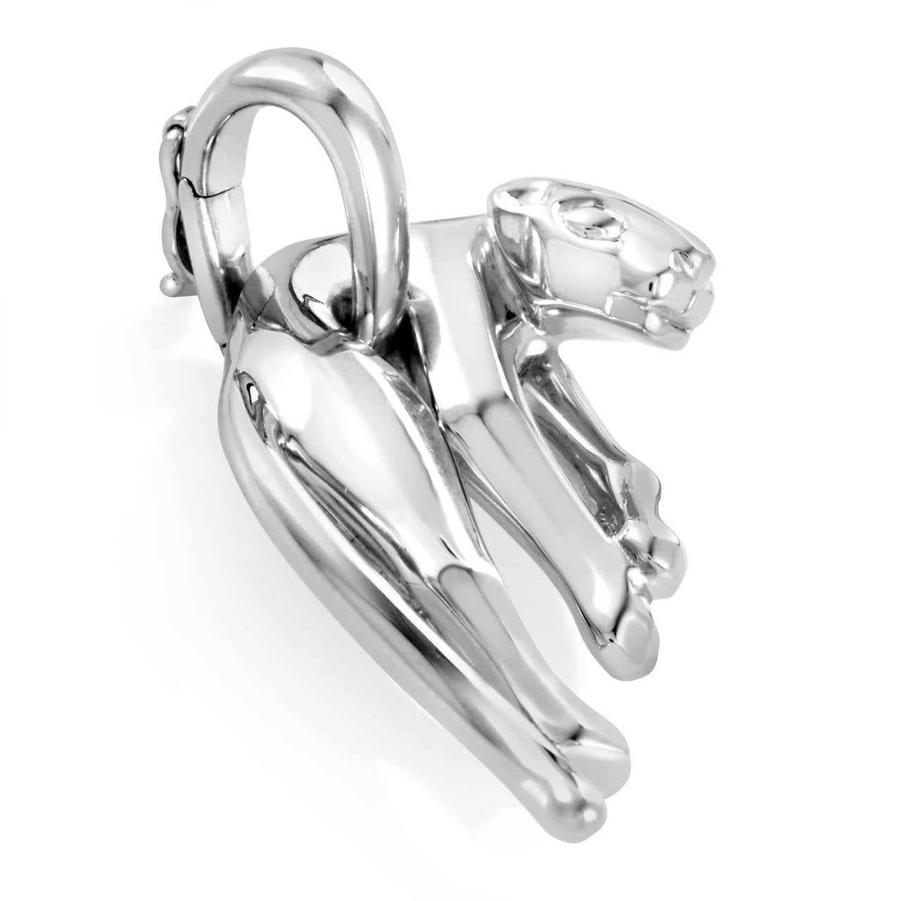 This piece from Cartier's famed Panthere collection is sure to turn heads, and garner much attention. The pendant is made of 18K white gold and is shaped like a panther.

Included Items: Manufacturer's Box and Papers
