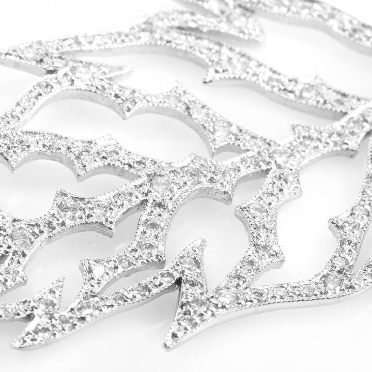 Ethereal and absolutely divine, this openwork pendant from Cathy Waterman has a fabulous look that will be treasured for many years to come. The pendant is made of 18K white gold and is shaped like a leaf set with a white diamond pave.
Diamond