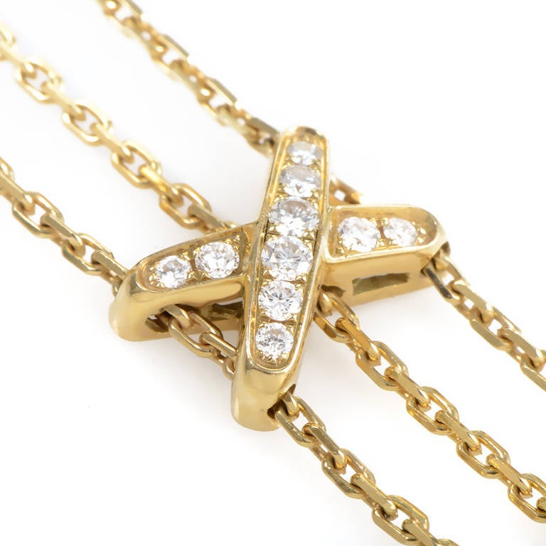 Bold and bright, this bracelet from Chaumet's Liens collection has a ravishing design that is quite fashionable. The bracelet is made of 18K yellow gold and is accented with diamond-set 