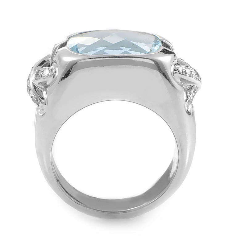The splendid design of this ring created by Jean Schlumberger and Tiffany & Co. transcends time with its cool beauty. The ring is made of platinum and is set with a faceted aquamarine stone. Lastly, two of Schlumberger's signature 