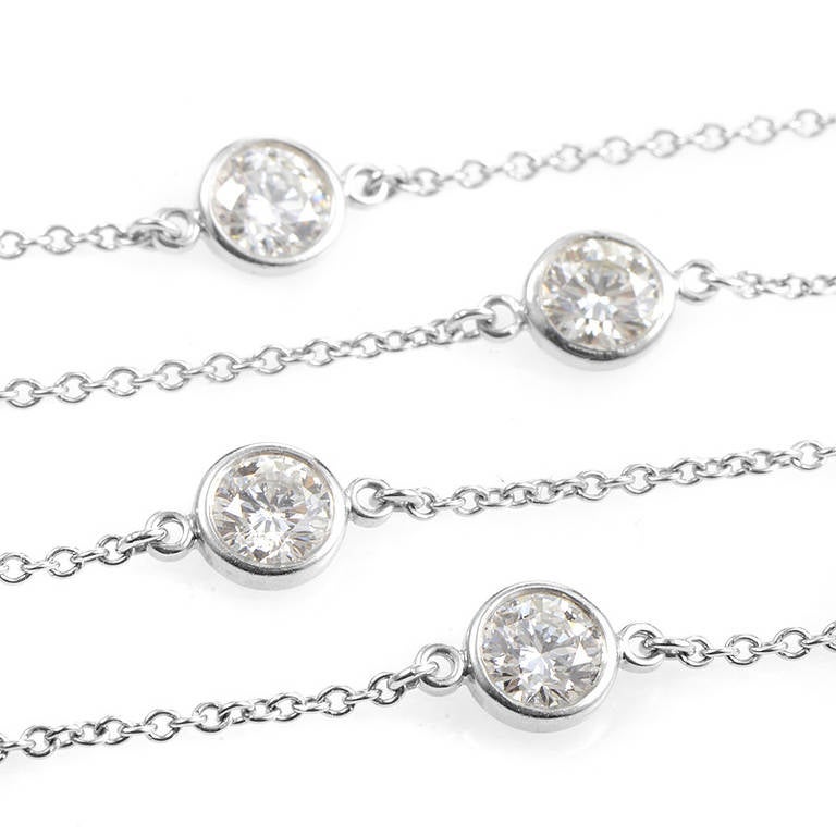 When famed jewelry designer Elsa Peretti teamed up with Tiffany & Co., only magic could happen. This necklace from the Diamonds by The Yard collection glimmers with a sophisticated, and elegant beauty. It is made of platinum and the design features