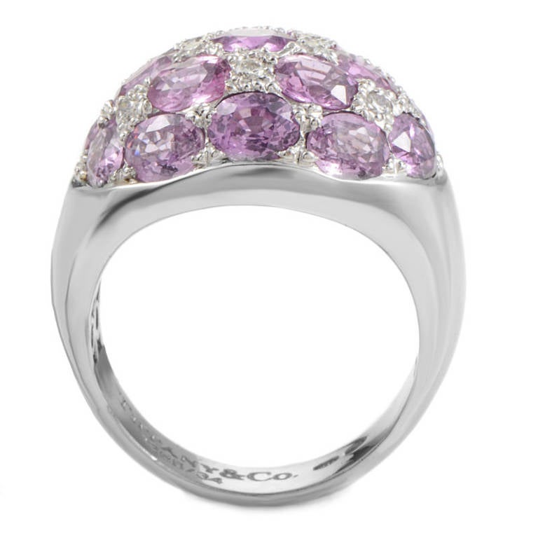 Luxurious and feminine, this ring from Tiffany & Co. is sure to be treasured for many years to come. The ring is made of 18K white gold and features a glittering white diamond and pink tourmaline pave.

Ring Size: 7.75 (55 7/8)
Diamond Carat