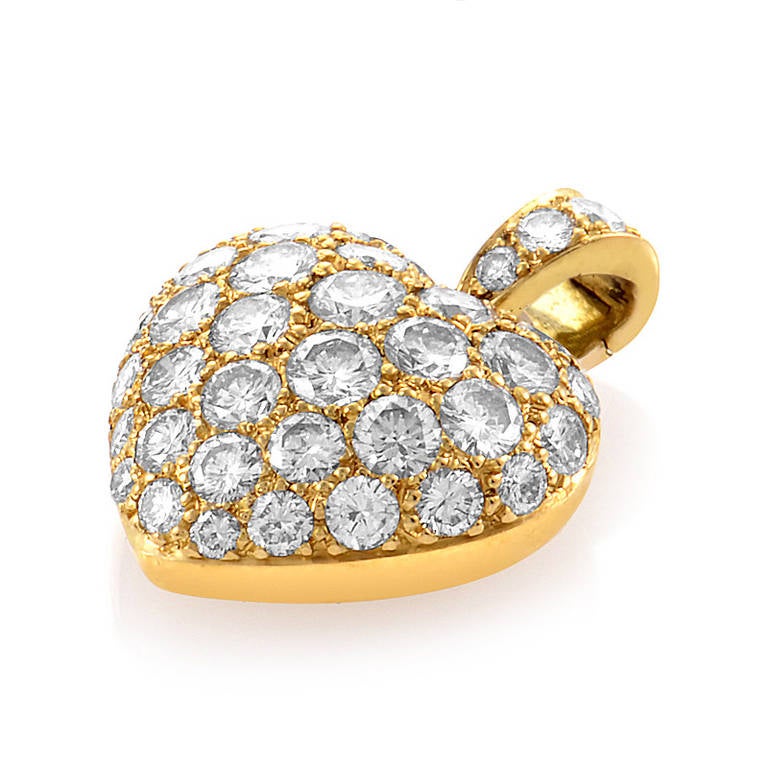 A pretty pave of diamonds is the hallmark of this elegant pendant from Cartier. The heart-shaped pendant is made of 18K yellow gold and is set with an ~2ct diamond pave.
Retail Price: $10,000.00
