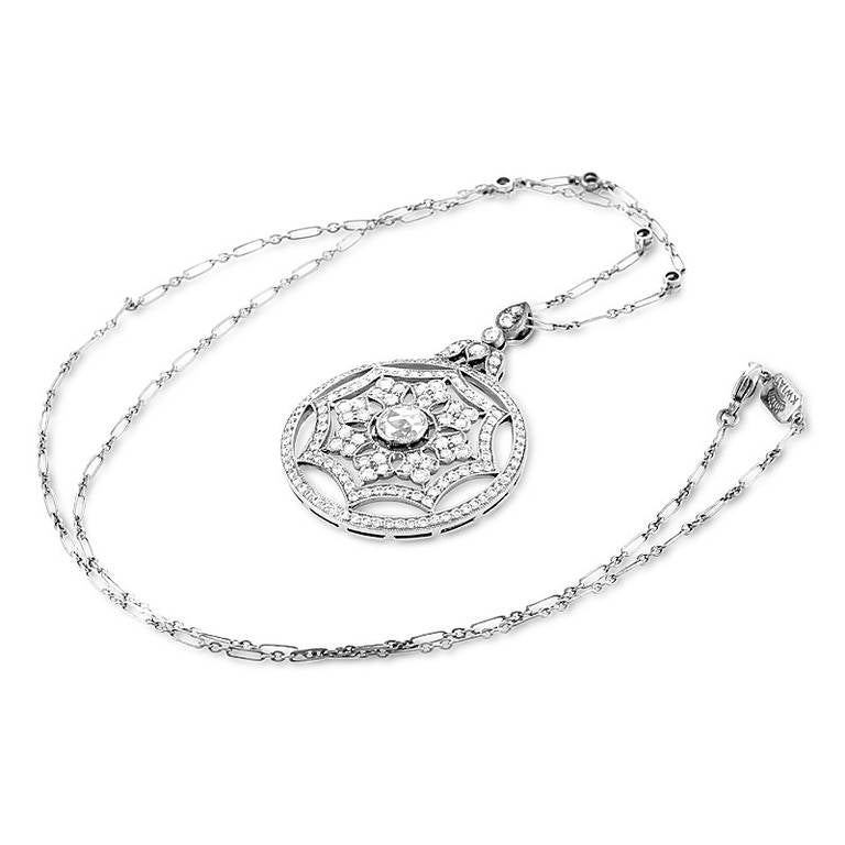 This pendant necklace from Kwiat has a fabulous design that radiates elegance. The necklace is made of 18K white gold and boasts an openwork pendant set with diamonds. Lastly, the chain itself is also studded with diamonds bringing the total diamond