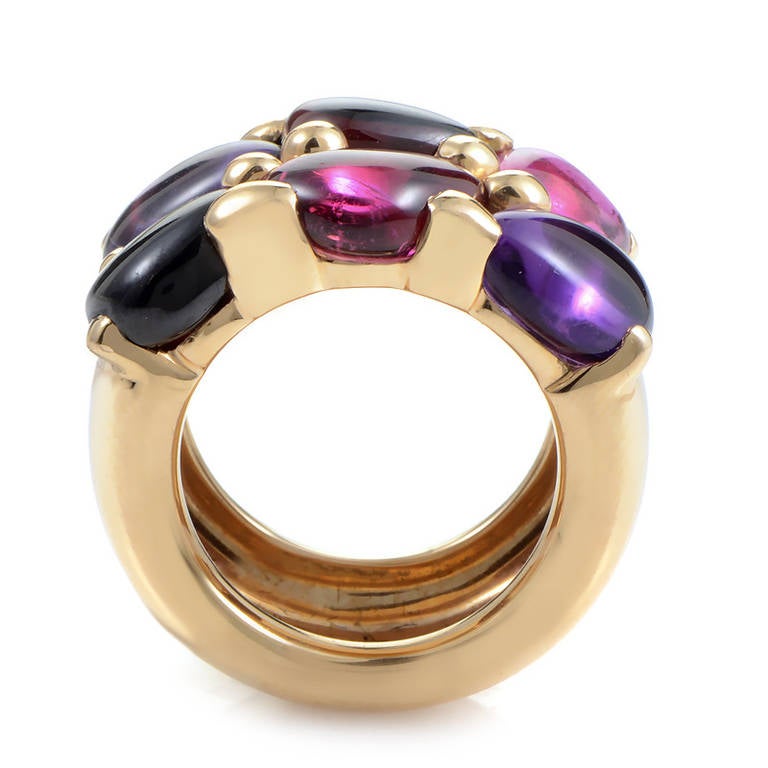 This colorful ring from Pomellato's Sassi collection is just that; sassy and striking! It is made of 18K yellow gold and is set with iolite and amethyst cabochons.
Retail Price: $8,920.00
Ring Size:6.75 (53 3/8)