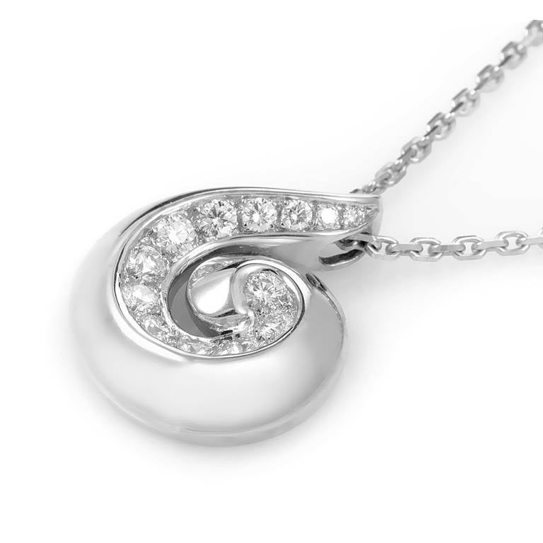 This lavish pendant necklace from Van Cleef & Arpels is truly outstanding and will be treasured for a lifetime. The necklace is made of 18K white gold and features a swirled pendant set with diamonds.
Diamond Carat Weight:0.40
Approximate