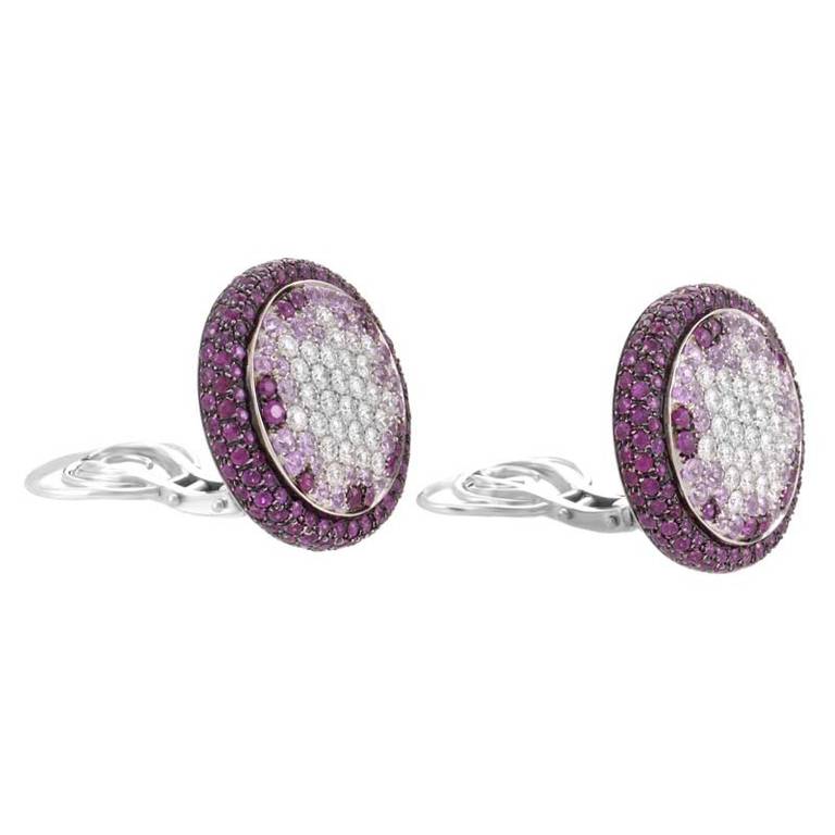 Gorgeous pinks paired with pristine white give this pair of earrings from Valente Milano an absolutely stunning appearance. The earrings are made of 18K white gold and are set with a pave comprised of ~6.90ct of pink sapphires and ~2.40ct of white