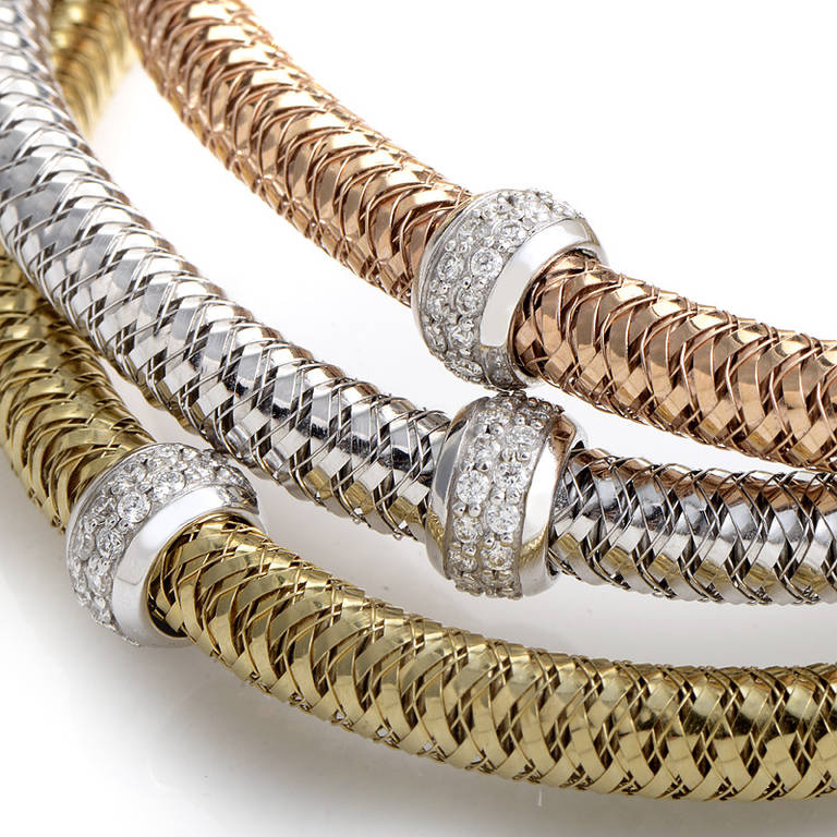 Three shades of gold come together in harmony to make this fabulous bracelet set from Roberto Coin's Primavera collection. The bracelets are each made of flexible 18K gold; one in white, one yellow, and one rose. Lastly, each bracelet is accented