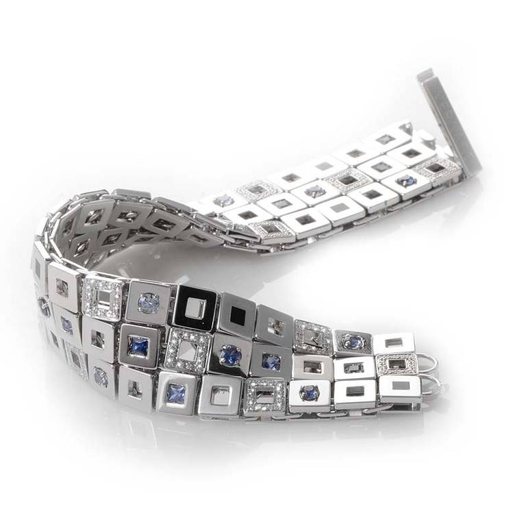 This bracelet from Versace's Maia Collection is refined and unique. It is made of 18K white gold and boasts a design that features onyx, ~3.10ct of sapphires and ~.84ct of diamonds.
Retail Price: $76,500.00