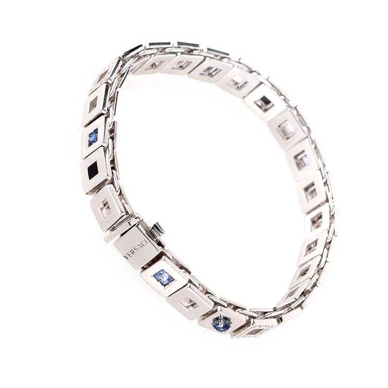 This bracelet from Versace's Maia Collection is refined and unique. It is made of 18K white gold and boasts a design that features ~1.30ct of sapphires accented with ~.24ct of diamonds.
Retail Price: $27,650.00