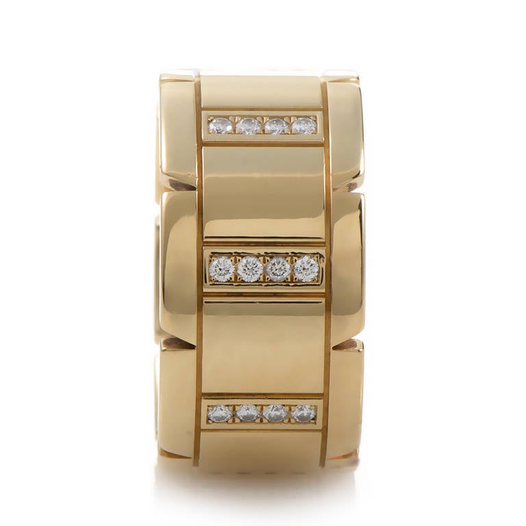 This band ring from Cartier's Tank Francaise collection has a clean-cut and classic design perfect for the person who enjoys subtle luxuries. The ring is made of 18K yellow gold and is set with ~.35ct of diamonds.
Included Items: Manufacturer's