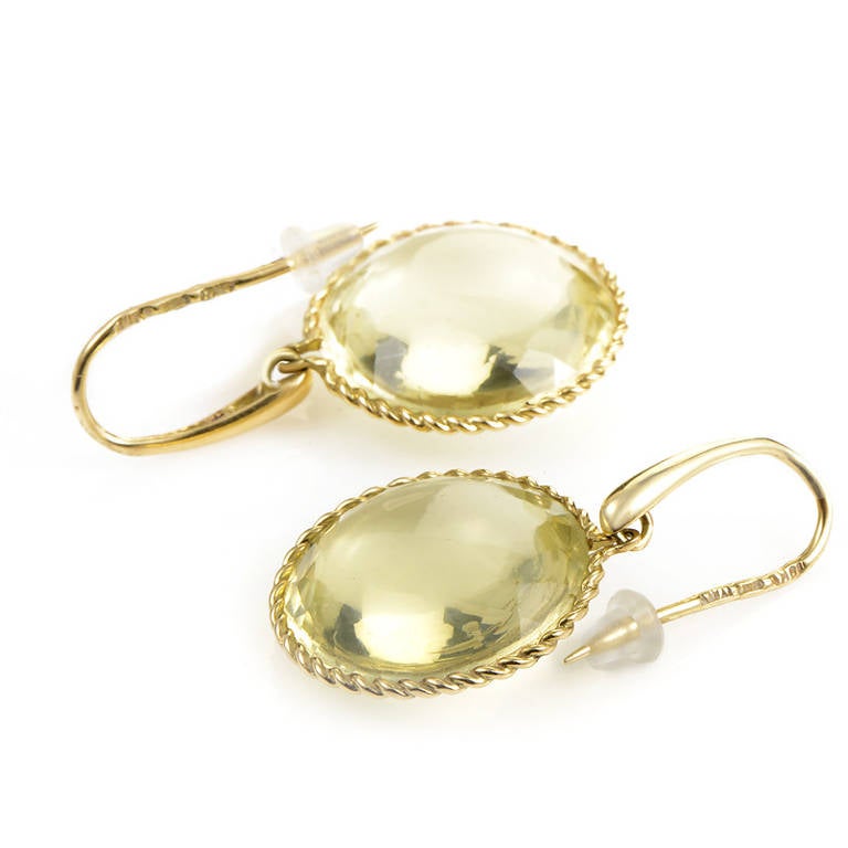 Like delicate droplets of sunlight, this pair of earrings from Roberto Coin's Ipanema collection are positively brilliant! The earrings are made of 18K yellow gold and each is set with a faceted citrine stone.