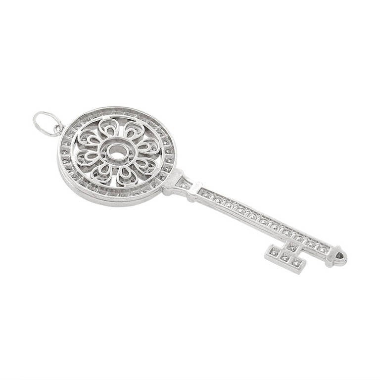 Tiffany & Co. is world renowned for the intricacy and superior quality of their jewelry designs. This pendant from the Tiffany Keys collection is a perfect example of their exceptional jewelry-making prowess. The pendant is made of platinum with a
