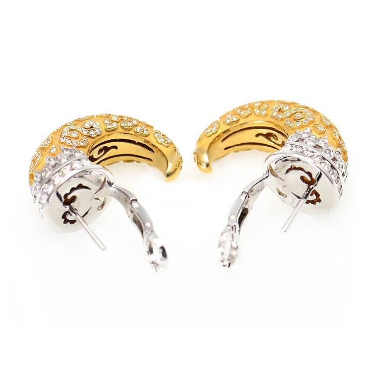 18K Yellow Gold Earrings Bull Horn Design In Matte Gold With Diamond Floral Lace Design and 18K White Gold Elegant Diamond Trim from Carrera Y Carrera Ava Collection. 
Total diamond weight - 2.66 ct.
Retail Price: $21,750.00 (Plus Tax)