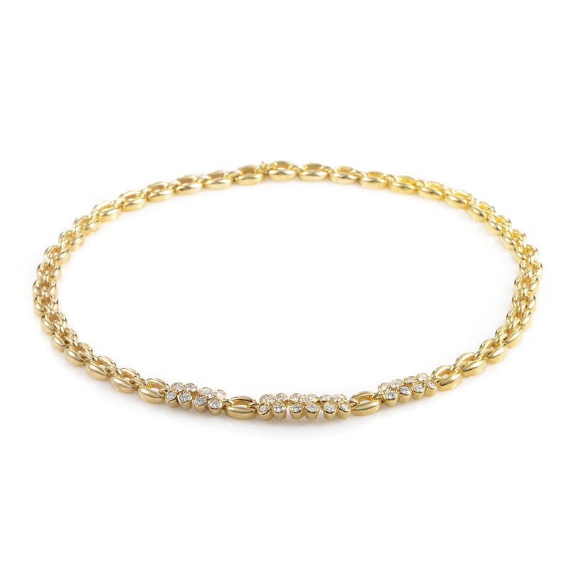 The ethereal glow of burnished-gold paired with pristine white diamonds makes this necklace from Van Cleef & Arpels a real gem! The necklace is comprised of 18K yellow gold links and is accented with delicate, diamond-set flowers.
Diamond Carat