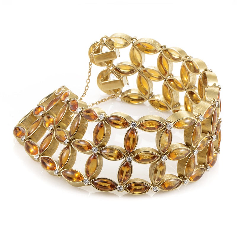 This fantastic bracelet from Piero Milano has a bright and sunny look that cannot be ignored. The bracelet is made of 18K yellow gold and is set with citrine flower petals accented with ~1.10ct of white diamonds.
Retail Price: $28,340.00 (Plus Tax)