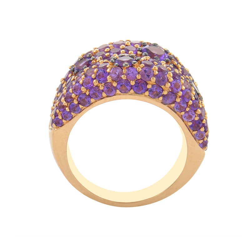 A tide of 3.50ct amethyst rises with fluctuating waves in this ring from Roberto Coin. The 18K rose gold band joins the spectacle creating sprinkles of its rich hue between the purple stones.
Retail Price: $3,100.00 (Plus Tax)
Ring Size: 6.75 (53