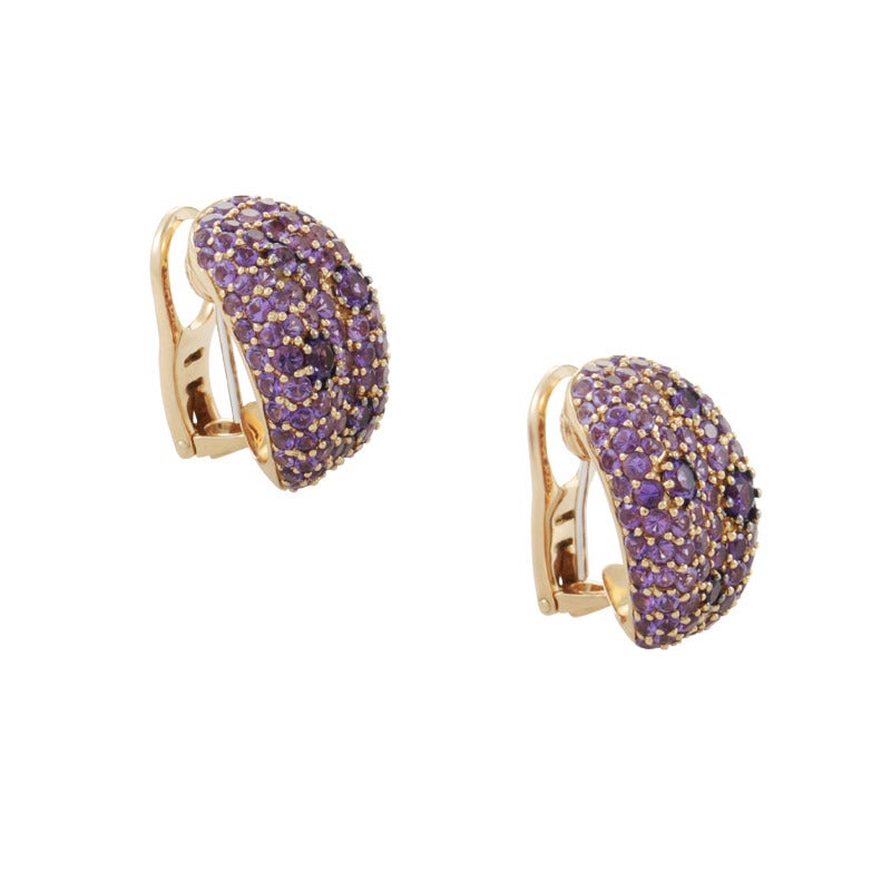 18K rose gold gives much of the body to these twin bouquets of 5.50ct of amethyst. Lastly, the decadent design of this pair of huggie earrings from Roberto Coin's Fantasia collection fasten to ear with a white gold post and a rose gold omega