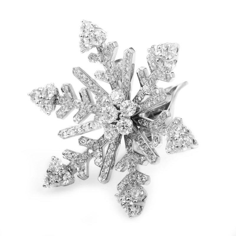 Intricately designed and dazzling to behold, this pair of earrings from Van Cleef & Arpels are inspired by the beauty of the winter season. The earrings are made of 18K white gold and are shaped to look like delicate snowflakes dusted with