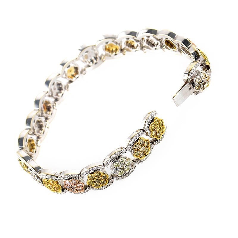 This bracelet is unique and shines with diamonds. The bracelet is made of 18K white, yellow and rose gold and boasts a design that features ~6.75ct of diamonds.

Retail Price: $28,980.00 (Plus Tax)