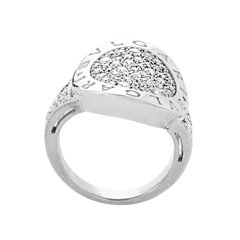 This diamond-set ring from Bulgari is unique and elegant- perfect for a glam lady. It is made of 18K white gold and is set with ~1.50ct of round brilliant diamonds.
Ring Size: 6.25 (52 1/8)
Retail Price: $8,350.00 (Plus Tax)