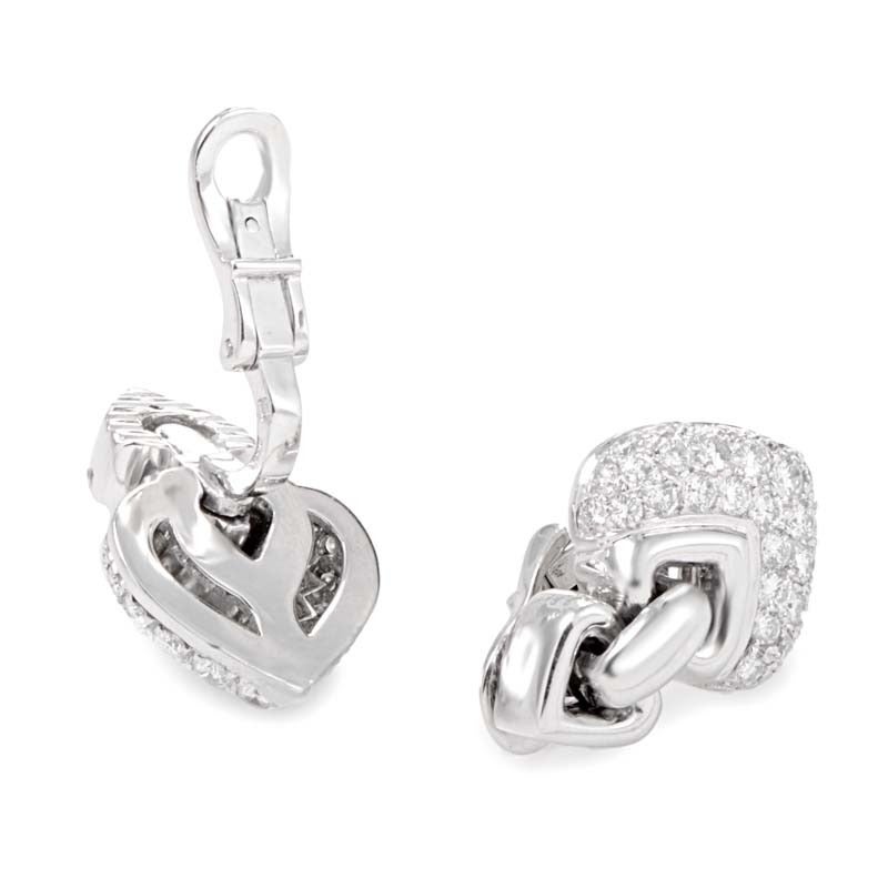This sumptuous pair of earrings from Bulgari are absolutely divine! The earrings are made of 18K white gold and feature dangling heart motifs set with an ~2.50ct diamond pave.
Retail Price: $16,000.00 (Plus Tax)
