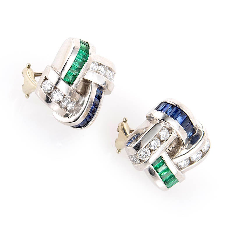 This pair of earrings from Charles Krypell are unique and sophisticated. They are made of platinum and boast a lovely design that features ~.96ct of sapphires and ~.74ct of emeralds. The colored stones are accented with ~1.12ct of diamonds.
Retail