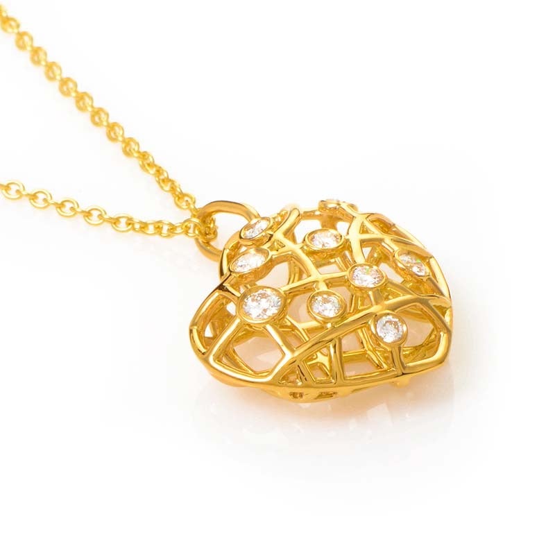 This pendant necklace from Hearts on Fire is lovely and sophisticated. It is made of 18K yellow gold and boasts a brocade heart-shaped pendant with ~.30-.40ct of diamonds.
Approximate Dimensions:Drop of the Necklace: 9.75