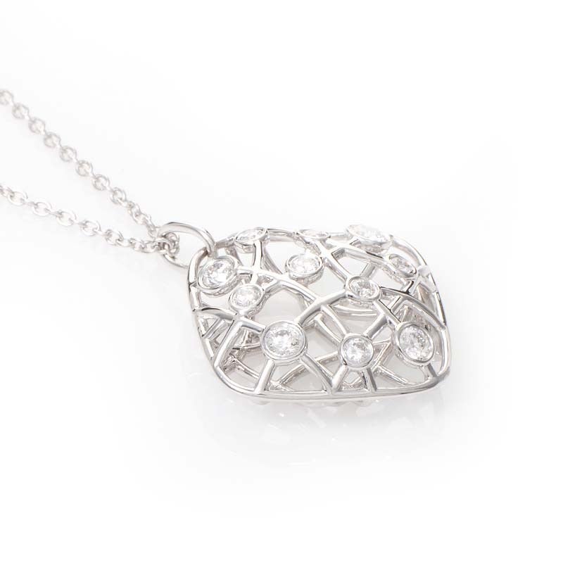 This pendant necklace from Hearts on Fire is gorgeous and shines with diamonds. It is made of 18K white gold and boasts a brocade square-shaped pendant set with ~.52-.62ct of diamonds.

Approximate Dimensions: Drop of the Necklace: 10