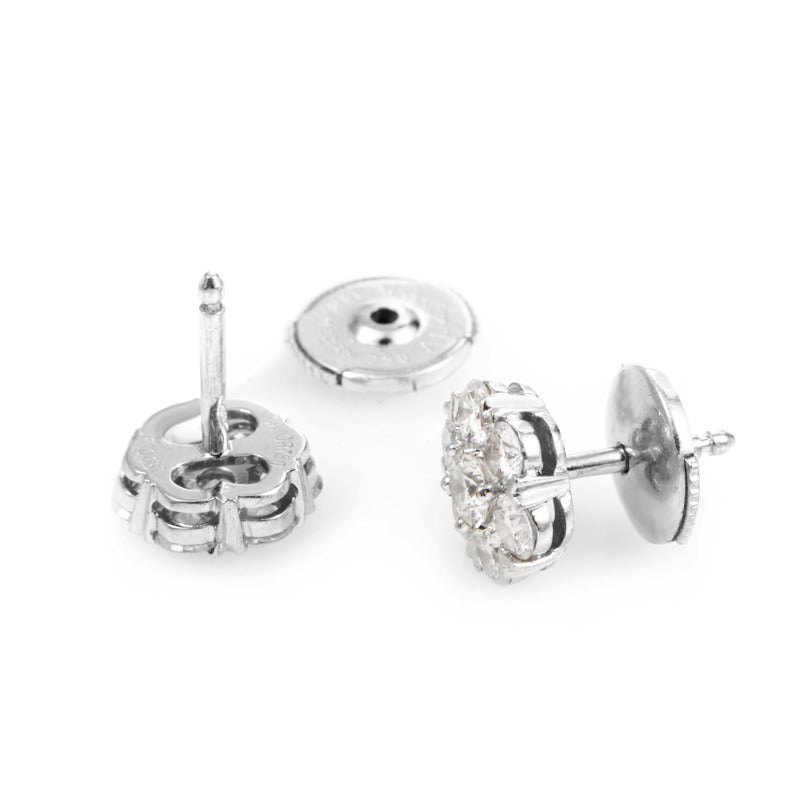 This pair of earrings from Van Cleef & Arpels renowned Fleurette collection are absolutely stunning! The earrings are made of 18K white gold and are set with ~1.10ct of diamonds.

Included Items: Manufacturer's Box
Color and Clarity: FG / SI1