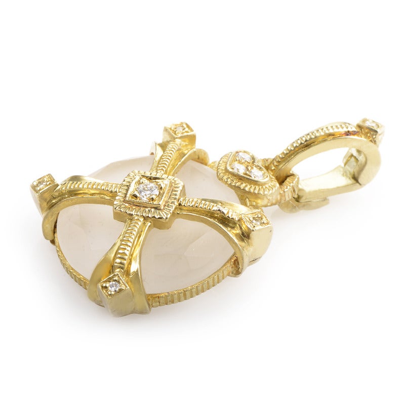 0.20ct of diamonds and a bold serving of quartz are part of the charm in this pendant from Judith Ripka. The 18K yellow gold criss-crosses across the bounty of quartz, as the diamonds stamp their presence at key points along the perimeter. The