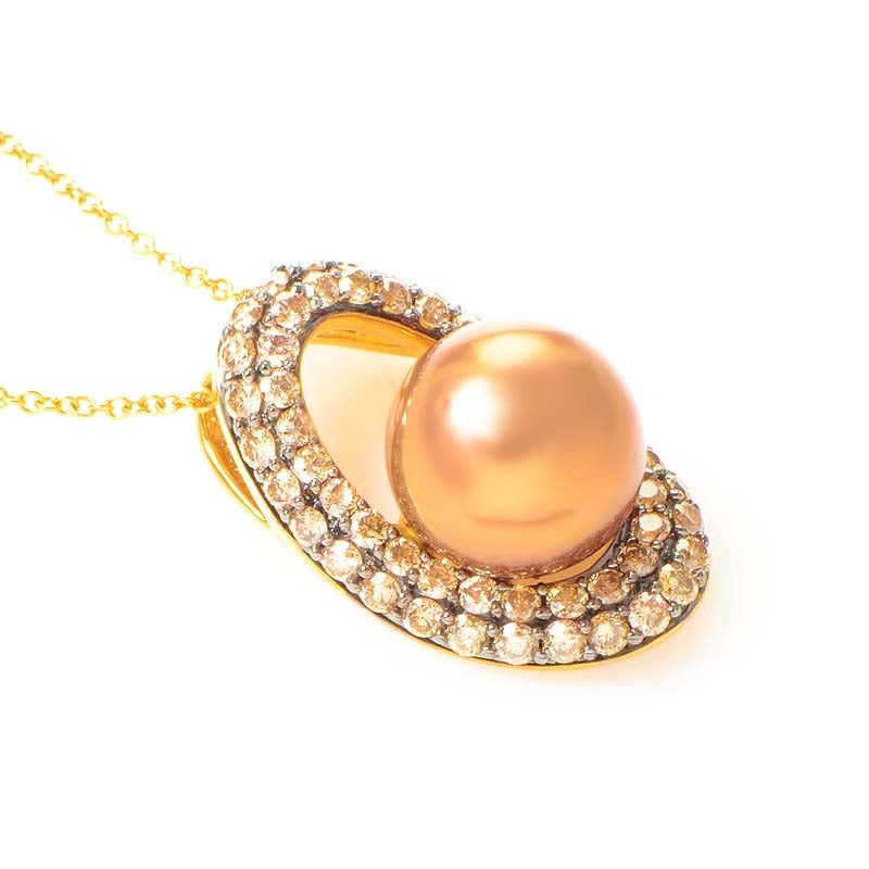 This pendant necklace from LeVian is refined and gorgeous. It is made of 14K yellow gold and boasts a lustrous brown pearl accented with ~1.05ct of champagne diamonds.

Approximate Dimensions: Drop of the Necklace: 9.75