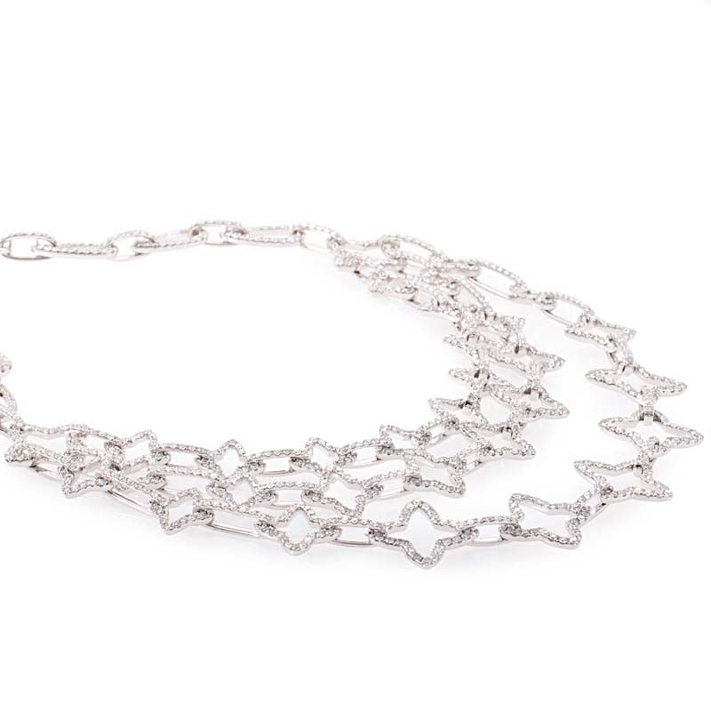 This multi-layered necklace from Odelia twinkles with diamonds just as brightly as the stars the necklace depicts. The necklace is made of 18K white gold and features numerous star-shaped motifs set with an incredible ~17.75ct diamond