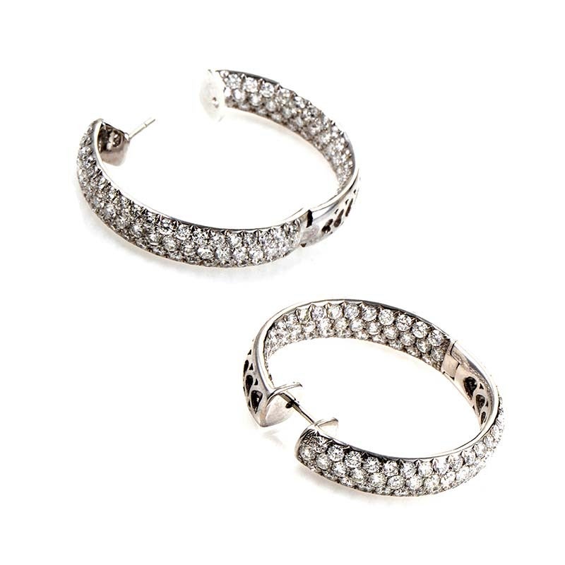 Odelia is known for their jewelry that is absolutely dripping in diamonds; this pair of earrings fits that description perfectly. This pair of hoop earrings are made of 18K white gold and are set with an ~6ct diamond pave.
Retail Price: $20,950.00
