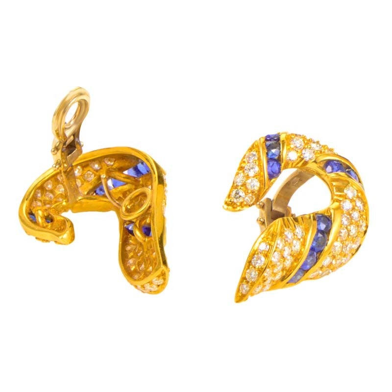 These earrings from Piero Milano are luminous and have an avant-garde design that is one-of-a-kind. They are made of 18K white and yellow gold and are set with ~4.36ct of sapphires and ~3.56ct of diamonds.
Retail Price: $25,430.00 (Plus Tax)