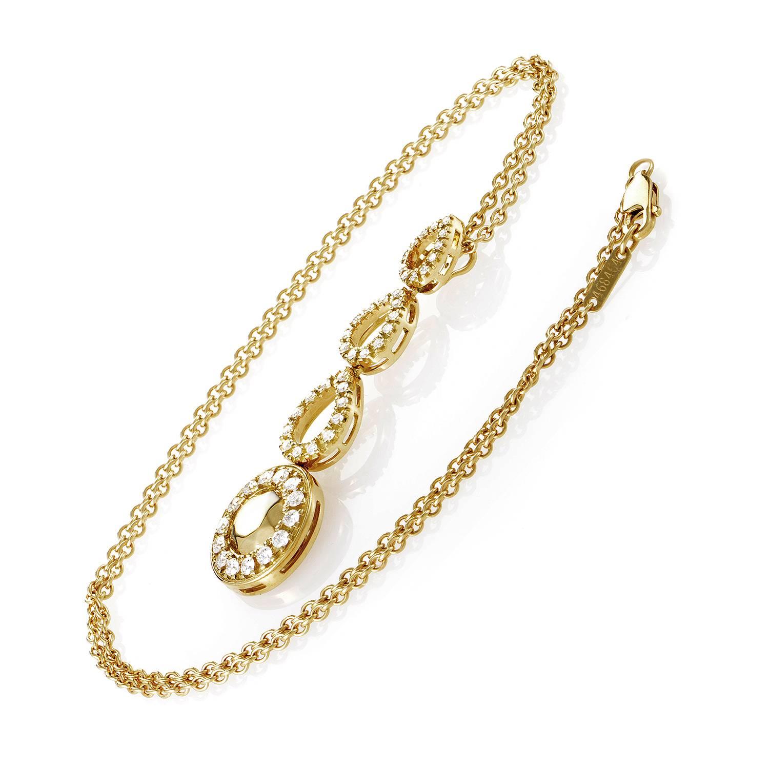 These tears are not weighed with melancholy but with luxury! The 18K Yellow gold chain drops in fine links toward the cumulative spill of three diamond-framed tears, their rich run culminating in the spherical punctuation of all the precious