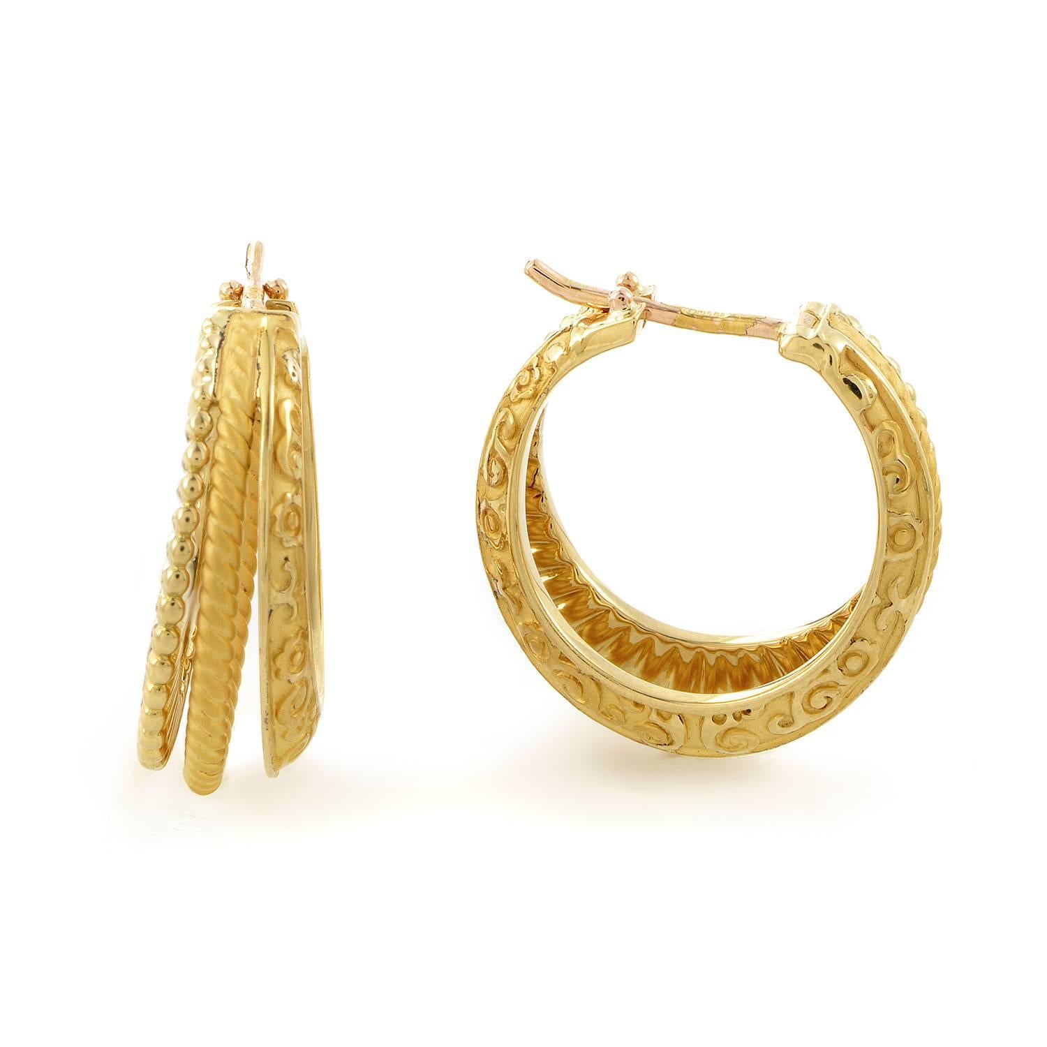 Carrera y Carrera triple their efforts with this intriguing earring design. In each earring the 18K Yellow Gold is given three turns, each one given its own texture and pattern. One perpetuates a beaded spin, the next takes on the ribbed texture of