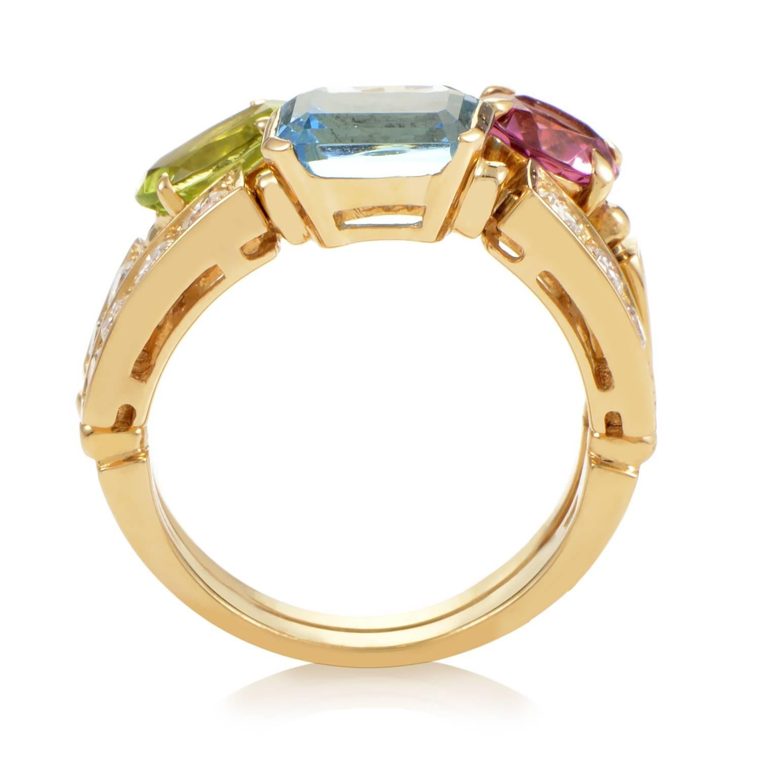 A complex study in spectacular design, this Bulgari ring is sure to captivate. The band of 18K Yellow Gold rises in two expanding threads that are quickly broken up into their respective segments of varying size, length and color. Multi-colored